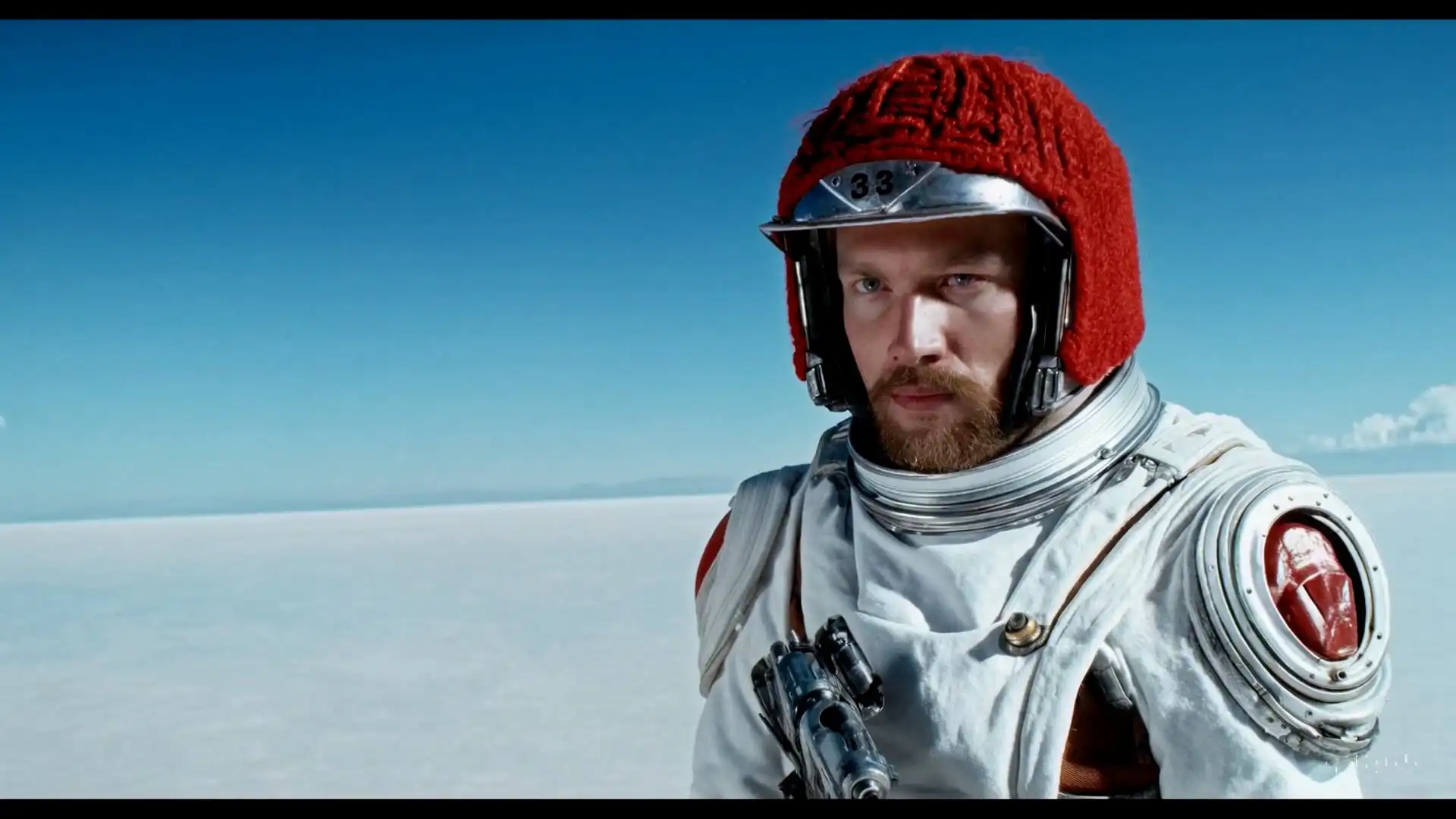 Thumbnail ofA movie trailer featuring the adventures of the 30 year old space man wearing a red wool knitted motorcycle helmet's video